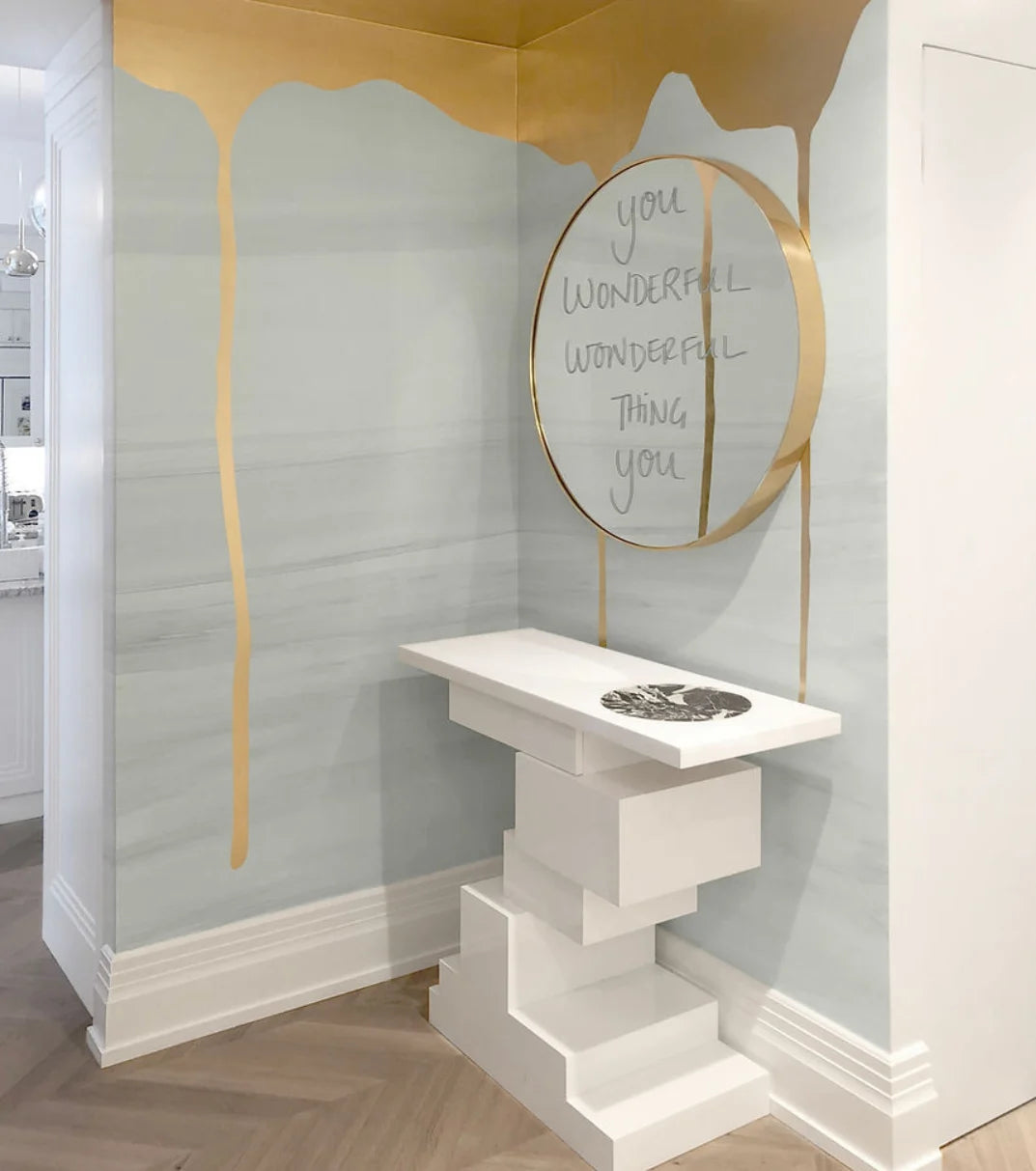 Sculptural console and mirror in a Cara Woodhouse interior